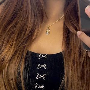 Shades of pink pendant with gold platted chain